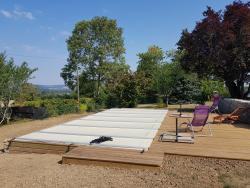 Piscine–béton–bois–traditionnelle–naturelle–bio–débordement-spa-combier-paysage-aquatique-71–Aménagement-extérieur-étude-paysagiste-Macon-Chalon–Louhans–Charolles–Cluny–Paray-Le Creusot-Montceau