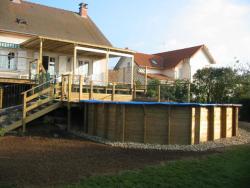 Piscine–béton–bois–traditionnelle–naturelle–bio–débordement-spa-combier-paysage-aquatique-71–Aménagement-extérieur-étude-paysagiste-Macon-Chalon–Louhans–Charolles–Cluny–Paray-Le Creusot-Montceau