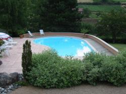 Piscine–béton–bois–traditionnelle–naturelle–bio–débordement-spa-combier-paysage-aquatique-71–Aménagement-extérieur-étude-paysagiste-Macon-Chalon–Louhans–Charolles–Cluny–Paray-Le Creusot-Montceau