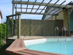 Piscine–béton–bois–traditionnelle–naturelle–bio–débordement-spa-combier-paysage-aquatique-71–Aménagement-extérieur-étude-paysagiste-Macon-Chalon–Louhans–Charolles–Cluny–Paray-Le Creusot-Montceau