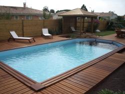 Piscine–béton–bois–traditionnelle–naturelle–bio–débordement-spa-combier-paysage-aquatique-71–Aménagement-extérieur-étude-paysagiste-Macon-Chalon–Louhans–Charolles–Cluny–Paray-Le Creusot-Montceau